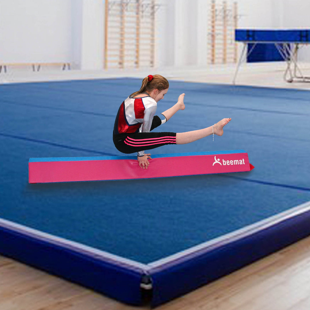 What Safety Measures Should Be Taken When Using a Gymnastics Beam?